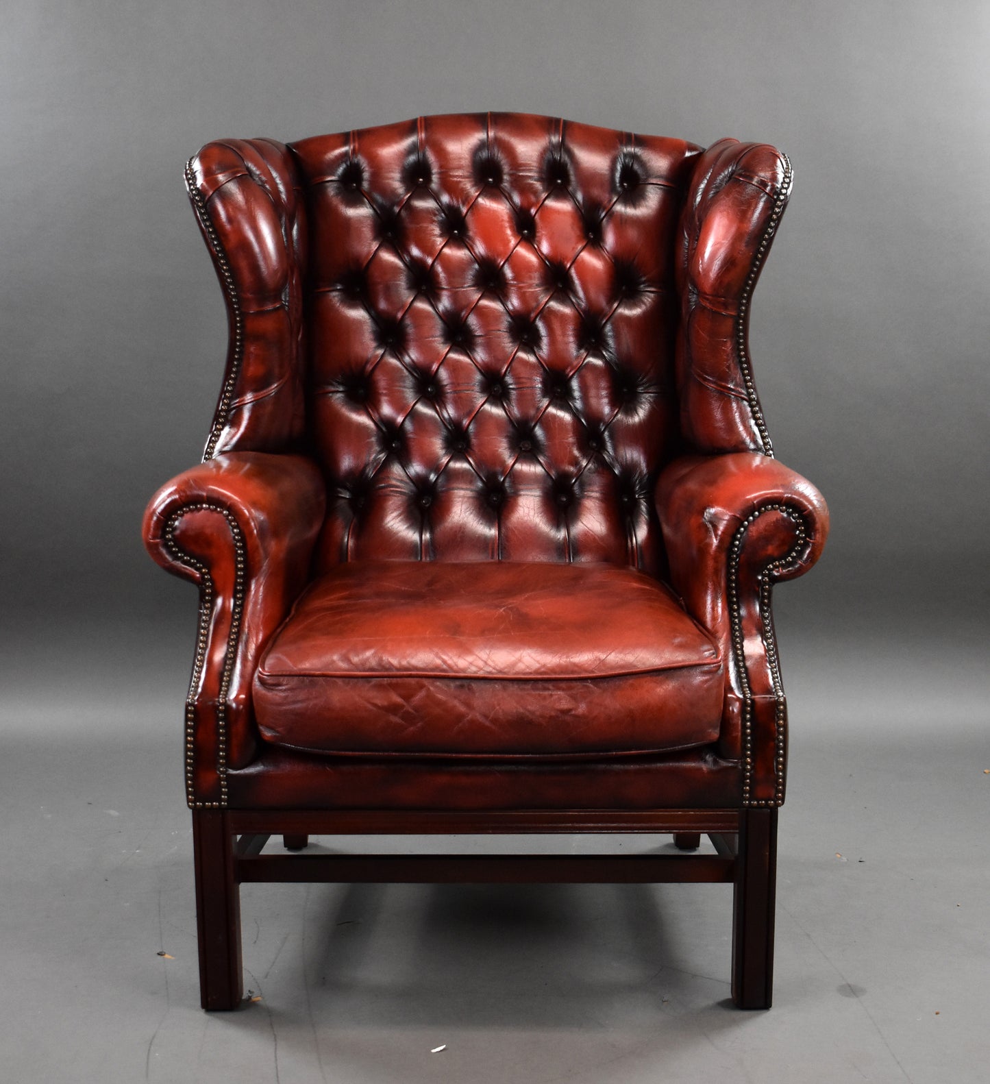 Ox Blood Red Leather Wing Back Armchair